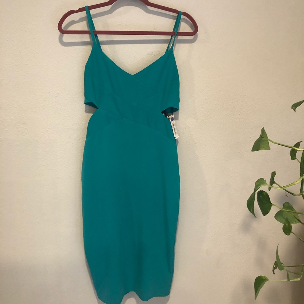 Beautiful midi green dress with cutouts
